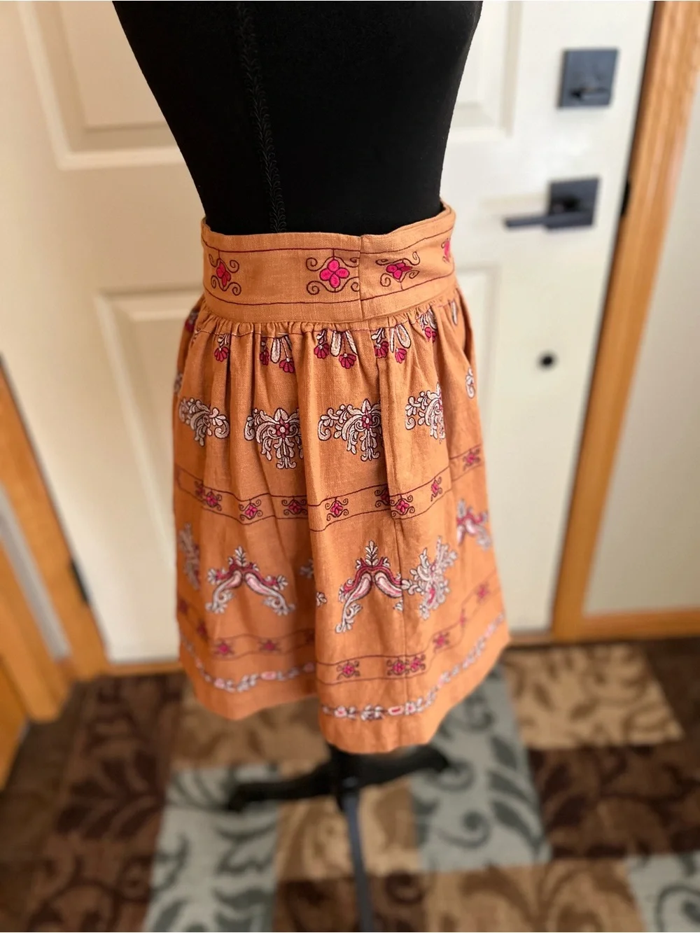 Anthropologie Meghan terracotta embroidered folkloric mini wrap skirt. Size 0